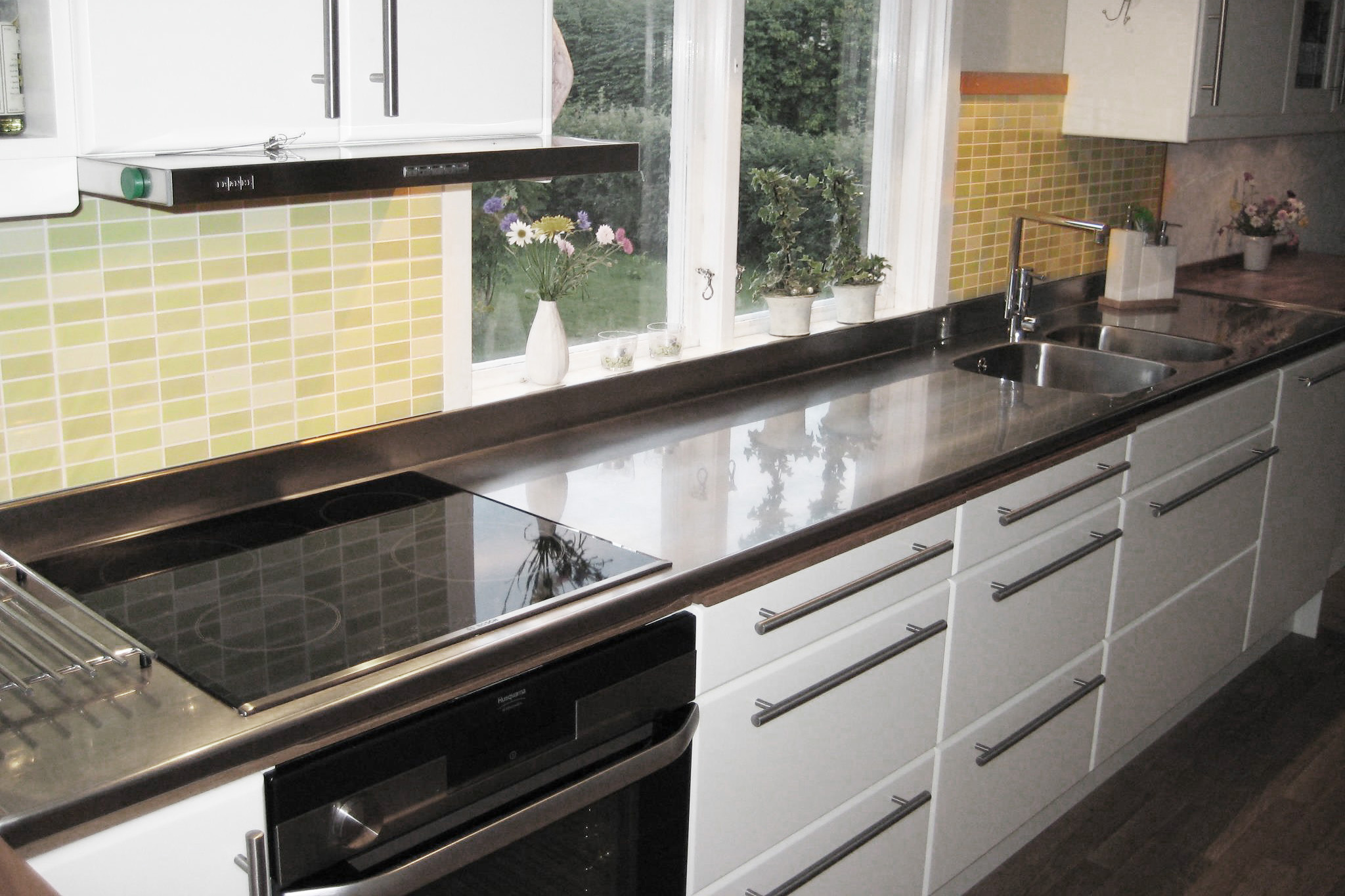 Diskbänk i rostfritt med häll